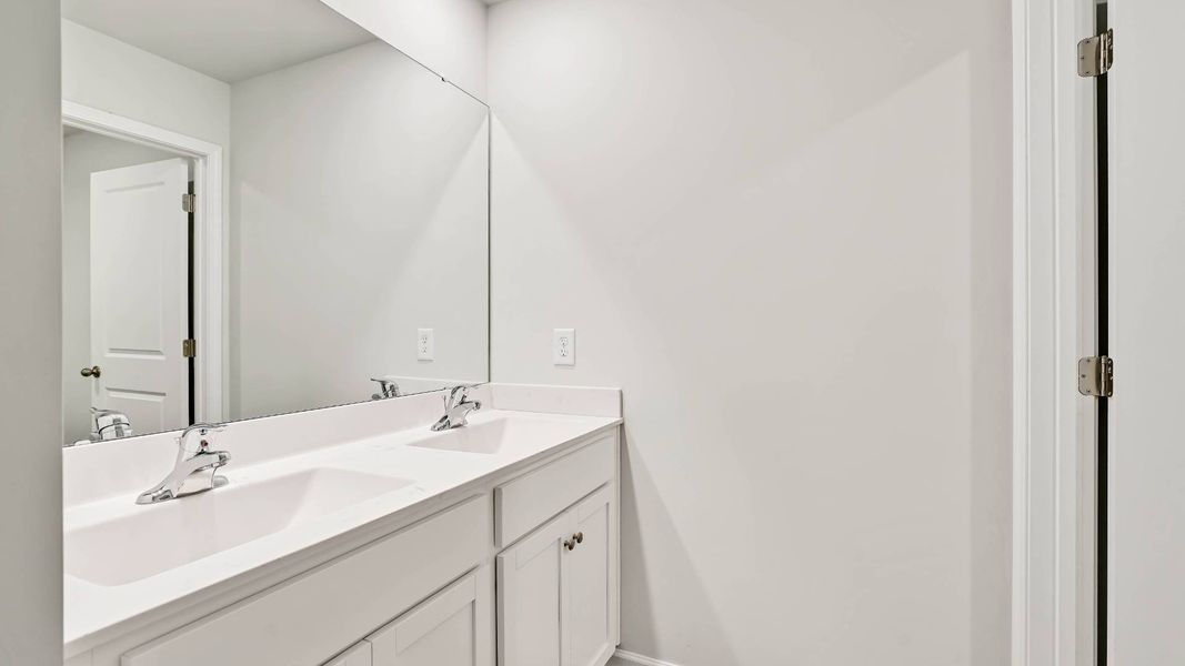 Furnished interior view inside a new home in Sidbury Station, Castle Hayne (Image 14).