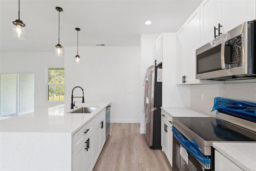 Furnished interior view inside a new home in , Ocala (Image 9).
