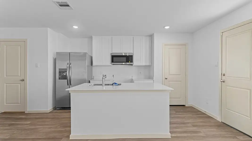 Furnished interior view inside a new home in Watermark, Alvin (Image 3). Furnished interior view inside a new home in Watermark, Alvin (Image 3).