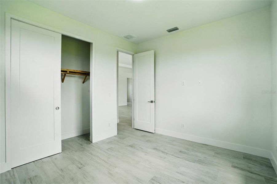 Spacious, unfurnished interior of a new home in , Port Charlotte (Image 40).