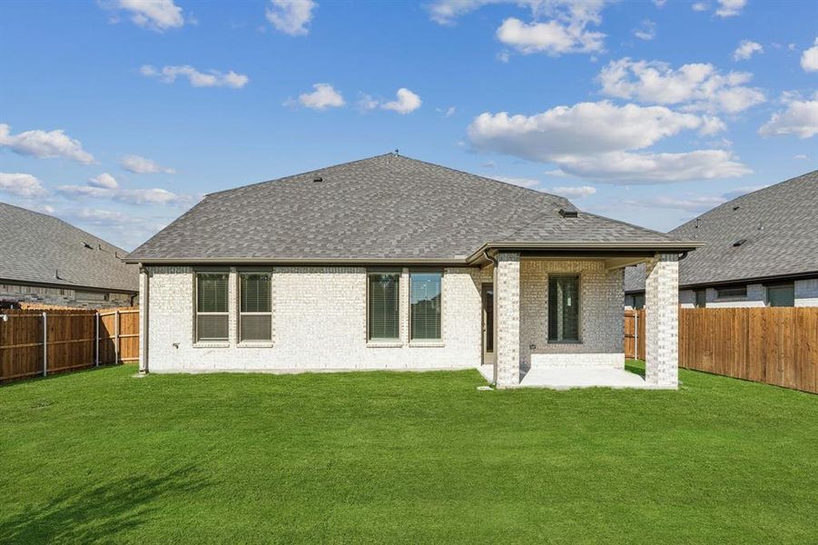 Covered Patio in the Winters home plan by Trophy Signature Homes – REPRESENTATIVE PHOTO