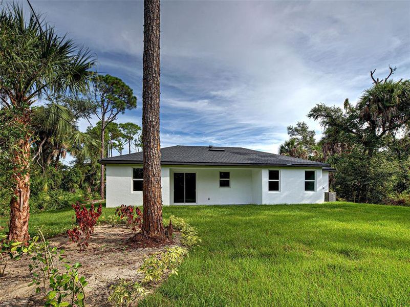 Front exterior of a new home in , Port Charlotte, FL, highlighting curb appeal (Image 26).