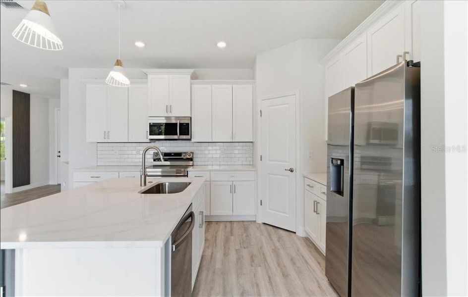 Furnished interior view inside a new home in , North Port (Image 18).
