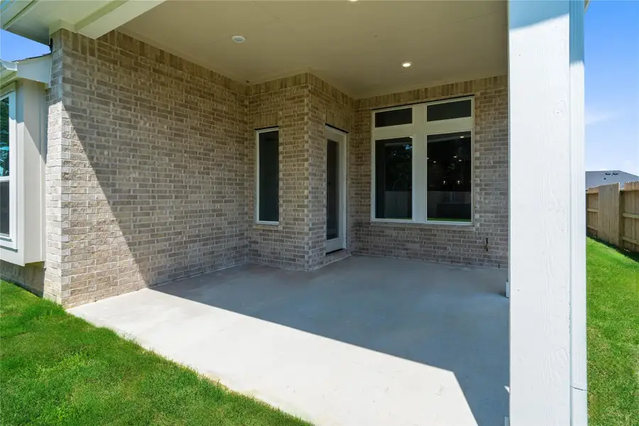 Exterior details and patio area of a home in Sorella, Tomball (Image 3). Exterior details and patio area of a home in Sorella, Tomball (Image 3).