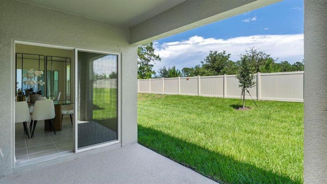Exterior details and patio area of a home in Villamar, Winter Haven (Image 2).