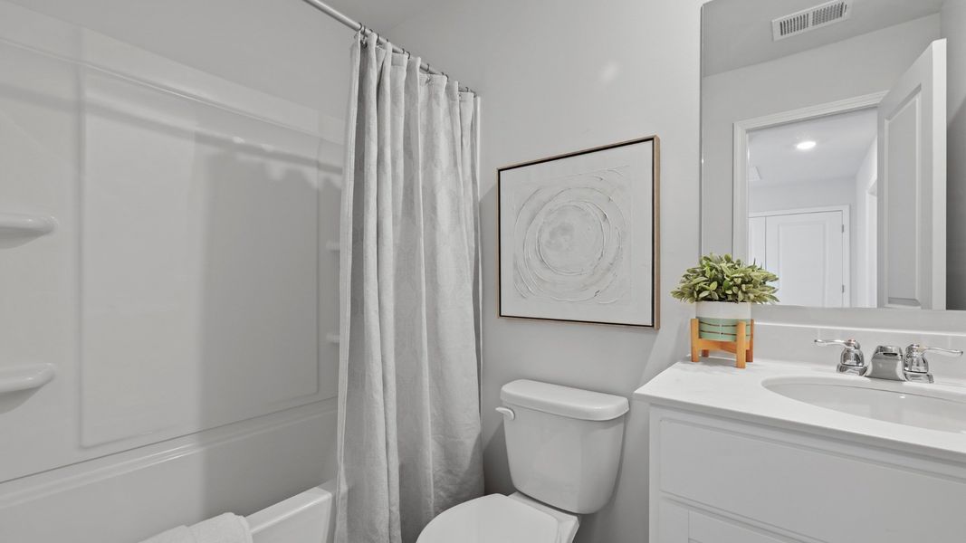 Representative furnished interior of a home built from the DUNCAN by D.R. Horton in Carolina Groves Townhomes, Moncks Corner (Image 22).