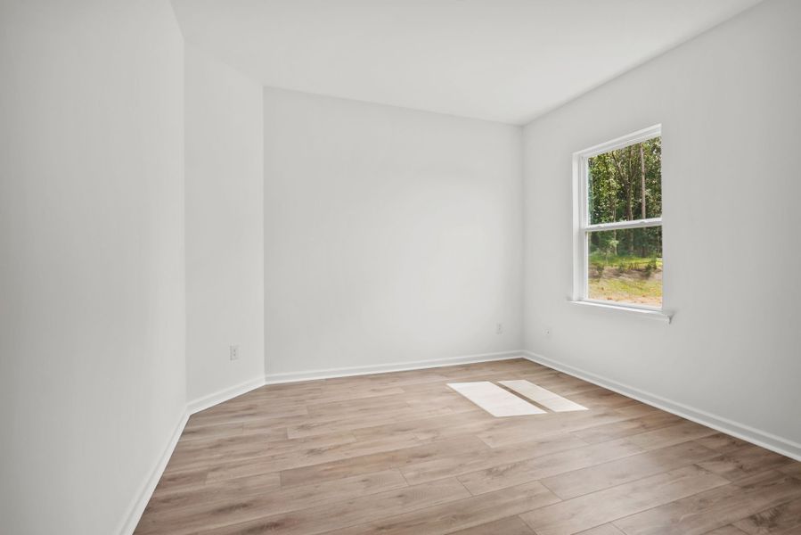 Spacious, unfurnished interior of a new home in Michaux Gardens, Belmont (Image 98).