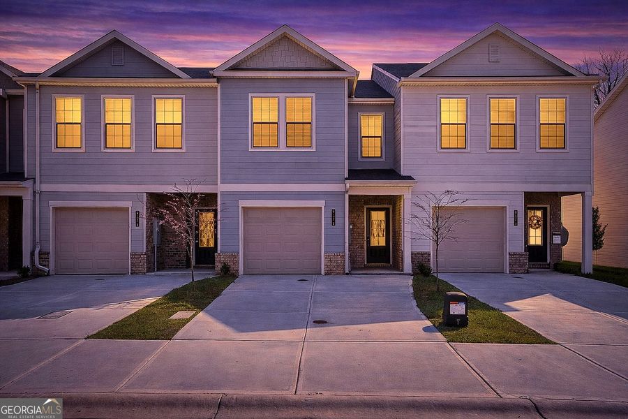 Front exterior of a new home in Morning Creek Forest, Atlanta, GA, highlighting curb appeal (Image 2). Front exterior of a new home in Morning Creek Forest, Atlanta, GA, highlighting curb appeal (Image 2).