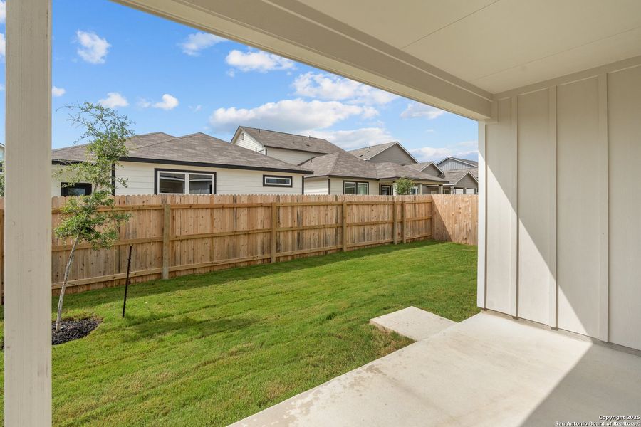 Front exterior of a new home in Highland Ridge, New Braunfels, TX, highlighting curb appeal (Image 14). Front exterior of a new home in Highland Ridge, New Braunfels, TX, highlighting curb appeal (Image 14).