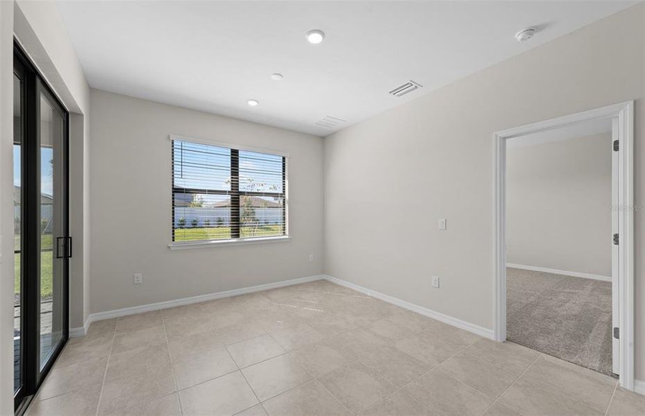 Spacious, unfurnished interior of a new home in The Strand at Cedar Grove, North Port (Image 16).