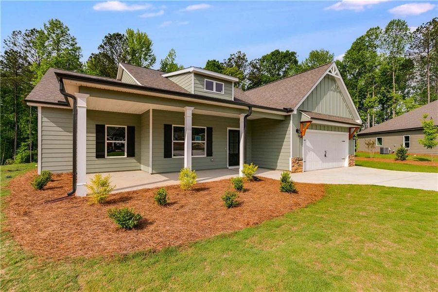 Front exterior of a new home in , Winston, GA, highlighting curb appeal (Image 1). Front exterior of a new home in , Winston, GA, highlighting curb appeal (Image 1).