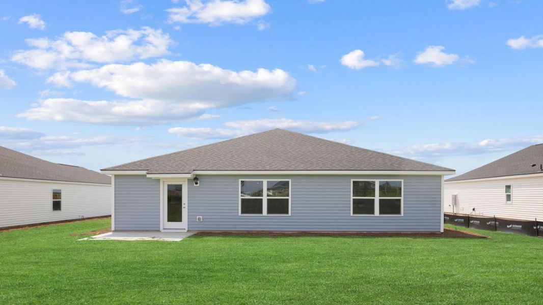 Exterior details and patio area of a home in Longleaf Village, Rincon (Image 2).