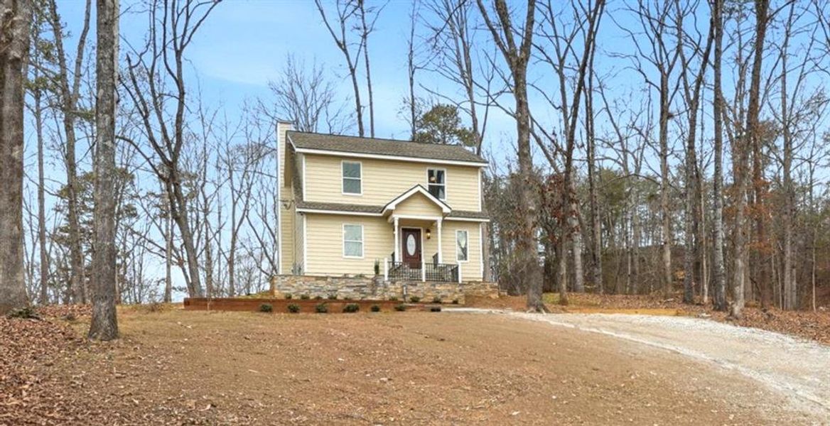 Front exterior of a new home in , Gainesville, GA, highlighting curb appeal (Image 23). Front exterior of a new home in , Gainesville, GA, highlighting curb appeal (Image 23).