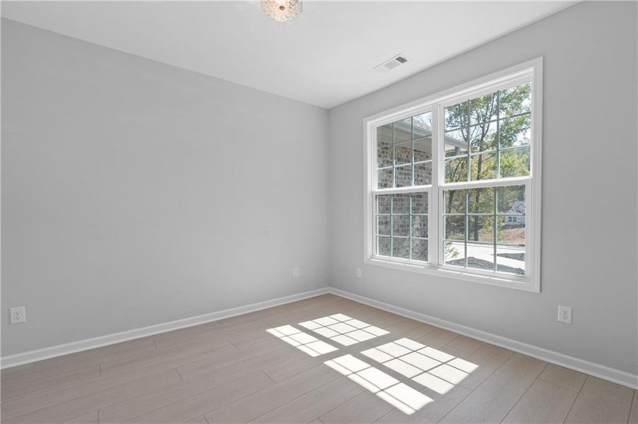 Spacious, unfurnished interior of a new home in , Gray (Image 23).
