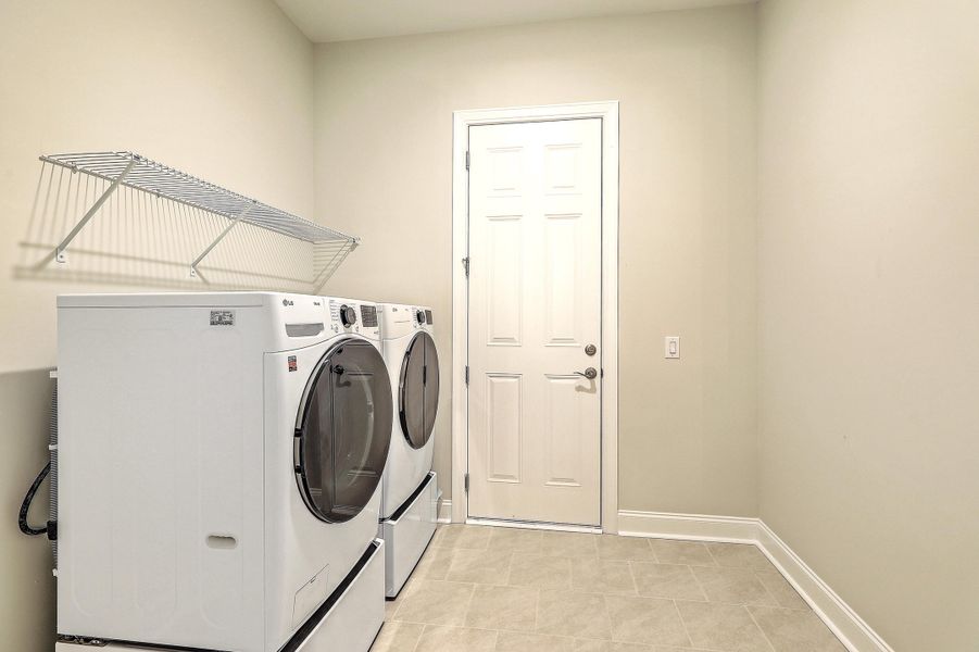 Furnished interior view inside a new home in K. Hovnanian's® Four Seasons at Lakes of Cane Bay, Summerville (Image 11).