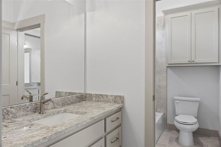 Jack and Jill bath between 2 secondary bedrooms - each with their own vanities