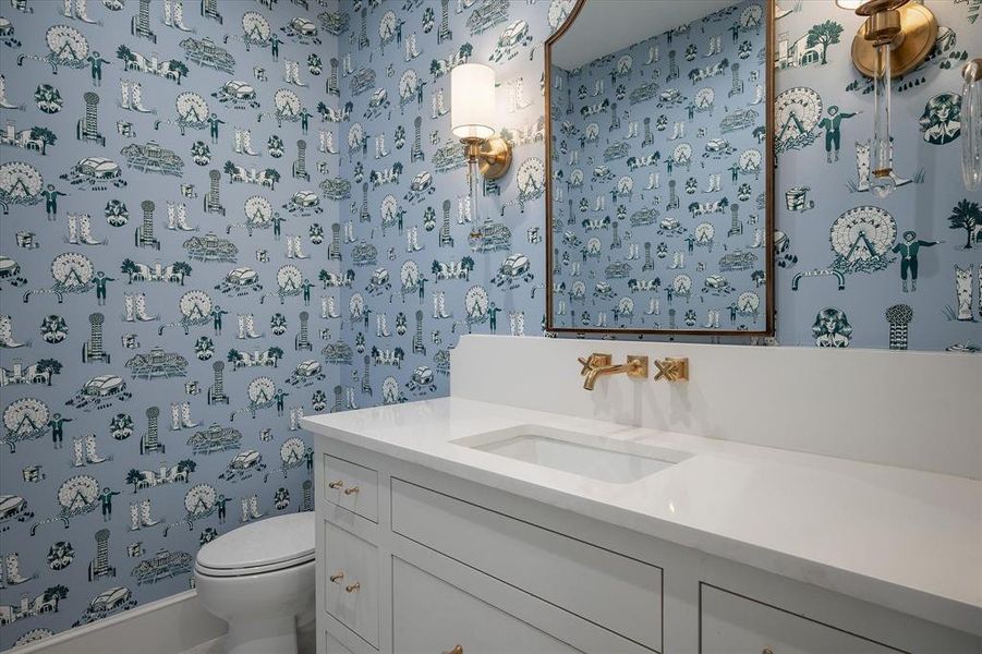 Bathroom featuring vanity and toilet