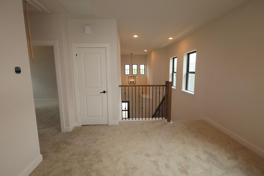 Spacious, unfurnished interior of a new home in Sienna - Grove Collection, Missouri City (Image 8). Spacious, unfurnished interior of a new home in Sienna - Grove Collection, Missouri City (Image 8).