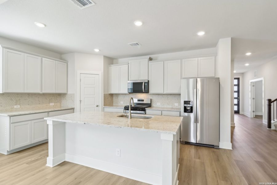 Furnished interior view inside a new home in Comanche Ridge, San Antonio (Image 3).