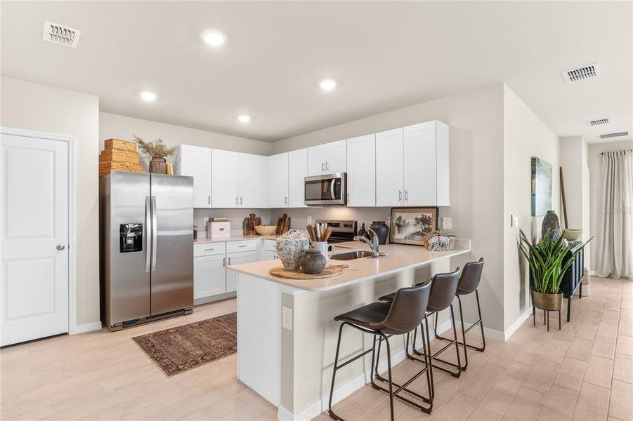 Furnished interior view inside a new home in Central Parc, North Port (Image 14). Furnished interior view inside a new home in Central Parc, North Port (Image 14).