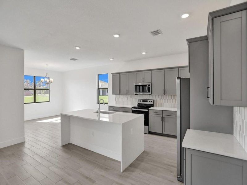 Furnished interior view inside a new home in , Homestead (Image 16). Furnished interior view inside a new home in , Homestead (Image 16).