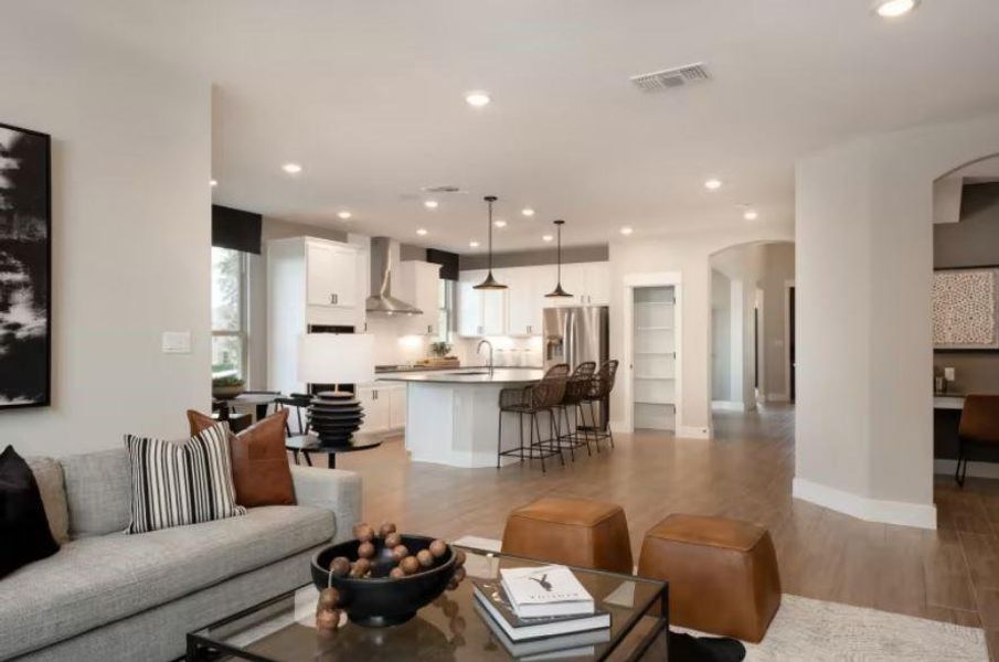 Photo of Pulte model home with same floor plan, not of actual home listed.