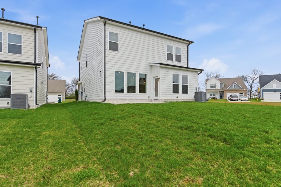 Exterior details and patio area of a home in Nexus – Park Collection, Gallatin (Image 25).