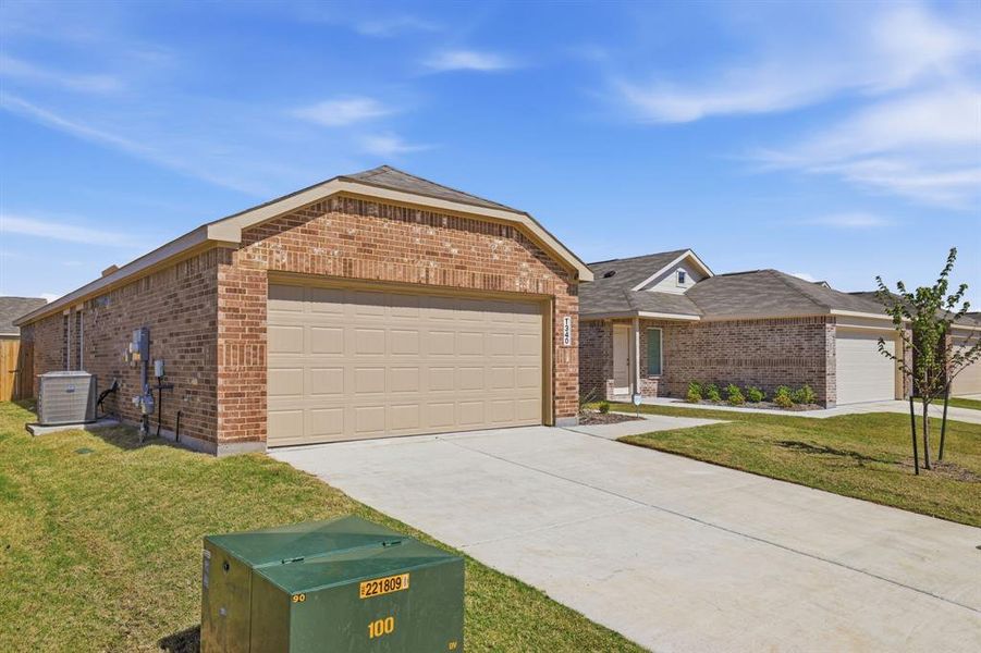Front exterior of a new home in Falcon Heights, Forney, TX, highlighting curb appeal (Image 2).