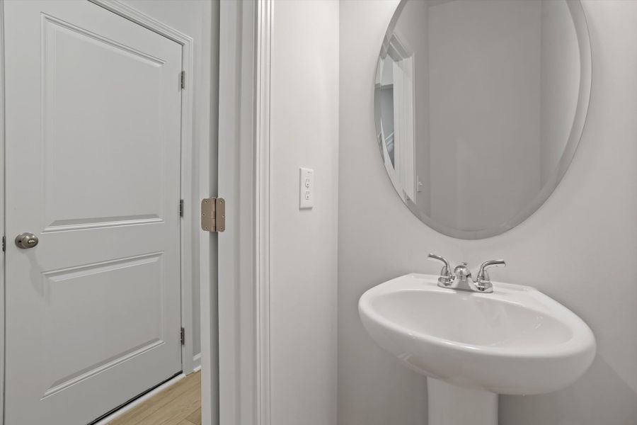 Furnished interior view inside a new home in West Main Townhomes, Sanford (Image 10).