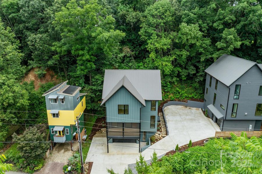 Front exterior of a new home in , Asheville, NC, highlighting curb appeal (Image 19).