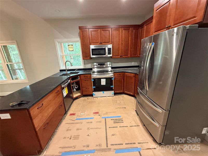 Looking toward Kitchen and Entry from Pella patio doors