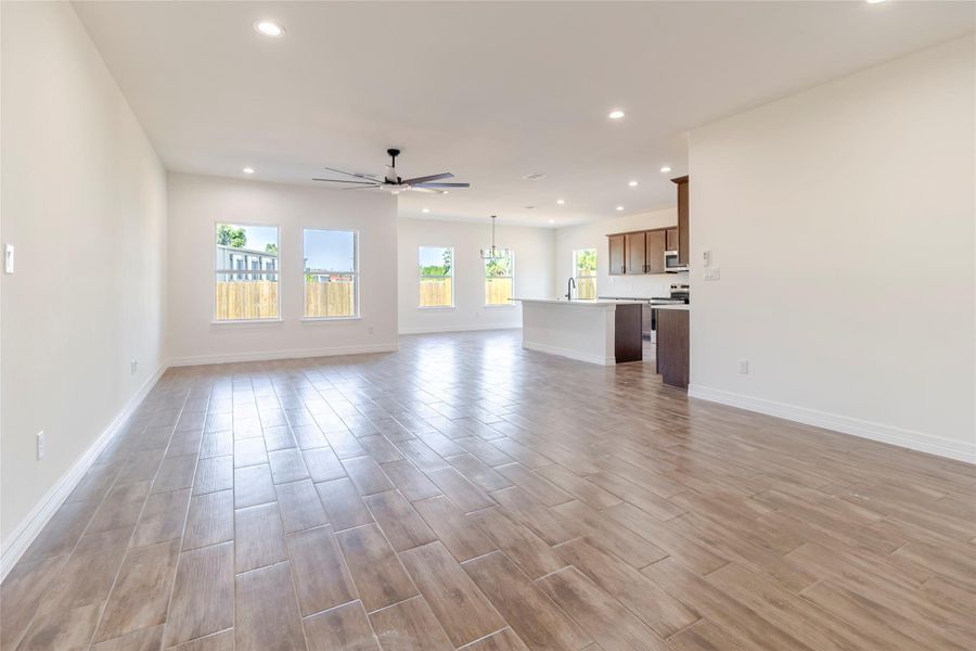 High ceilings and plenty of windows open up the shared kitchen, living, anddining area High ceilings and plenty of windows open up the shared kitchen, living, anddining area