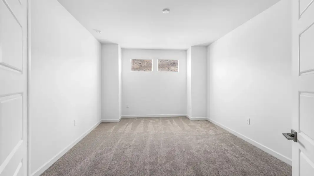Representative unfurnished interior of a home built from the Phoenician by D.R. Horton in El Cidro, Goodyear (Image 34).