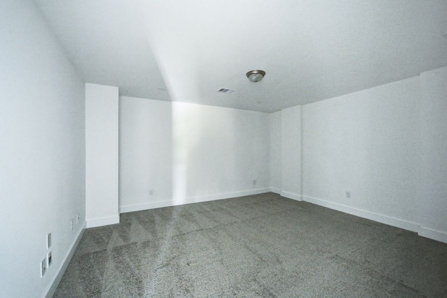 Spacious, unfurnished interior of a new home in Sundance Cove, Crosby (Image 47).