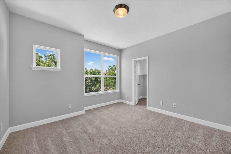 Secondary Bedroom with Style – Bright and versatile, this secondary bedroom is perfect for family, guests, or your favorite hobby.