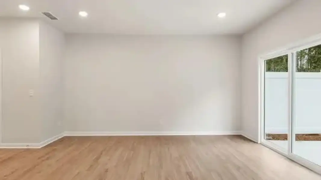 Spacious, unfurnished interior of a new home in Sherwood Square, Flowery Branch (Image 17).
