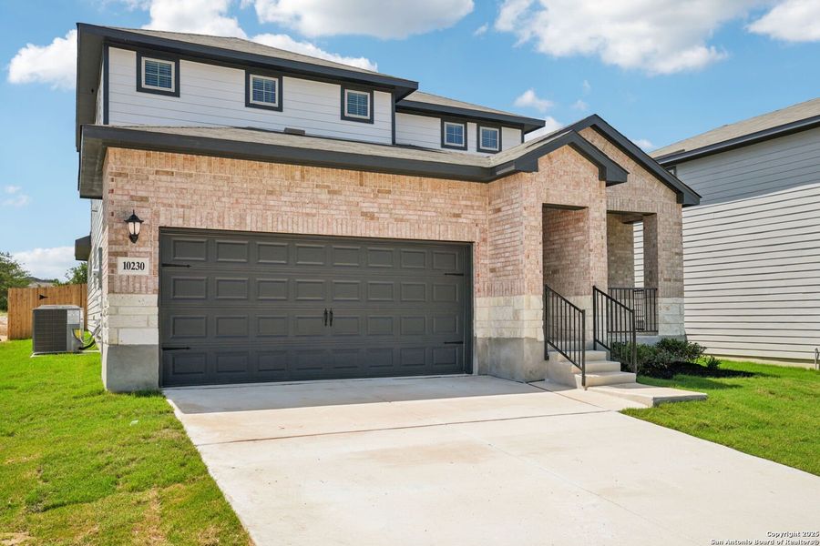Front exterior of a new home in Royal Crest, San Antonio, TX, highlighting curb appeal (Image 19). Front exterior of a new home in Royal Crest, San Antonio, TX, highlighting curb appeal (Image 19).