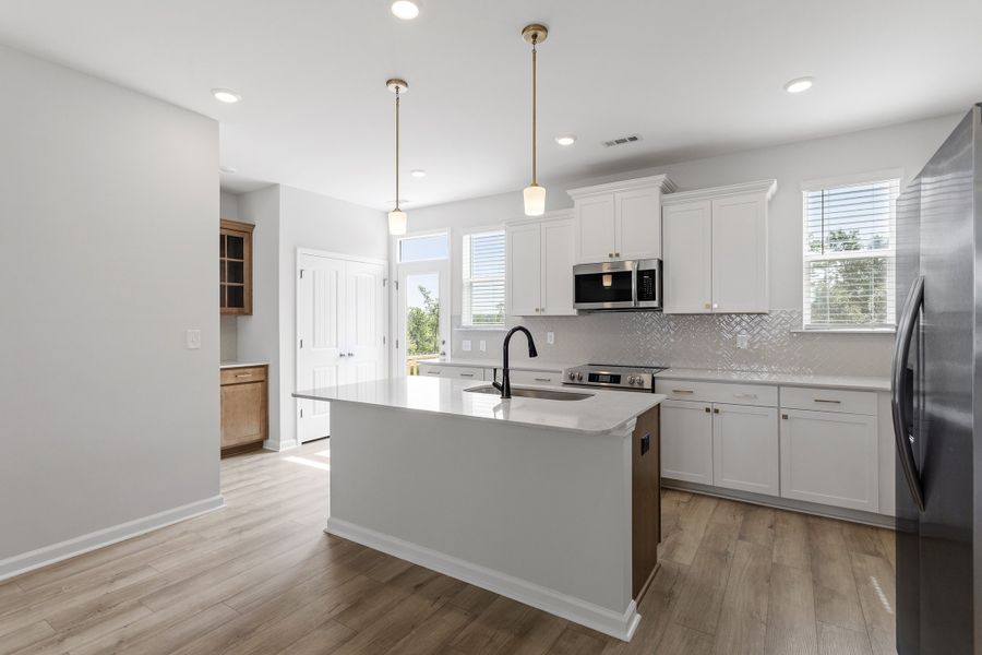 Furnished interior view inside a new home in Renaissance at White Oak, Garner (Image 8). Furnished interior view inside a new home in Renaissance at White Oak, Garner (Image 8).