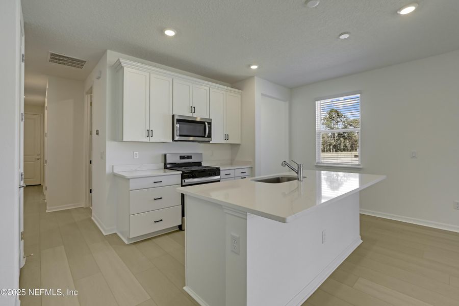 Furnished interior view inside a new home in , St. Augustine (Image 12).