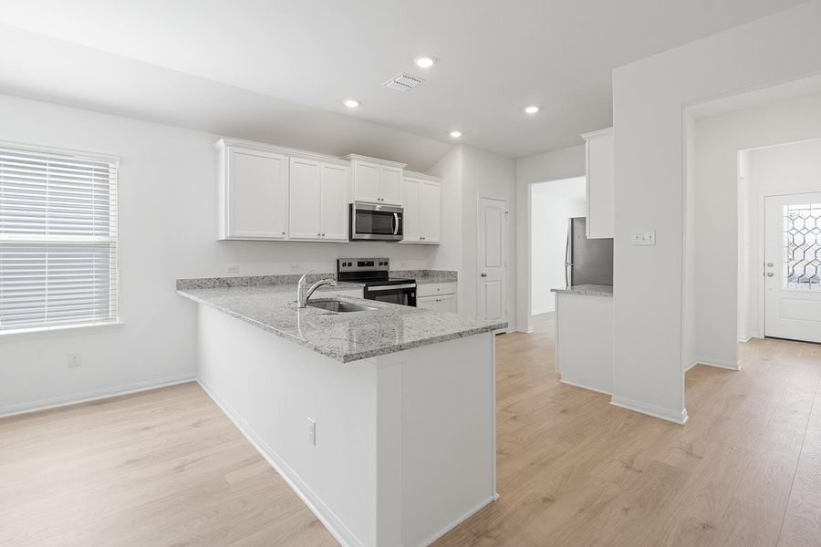 Furnished interior view inside a new home in Canyon Ranch, Jarrell (Image 3). Furnished interior view inside a new home in Canyon Ranch, Jarrell (Image 3).