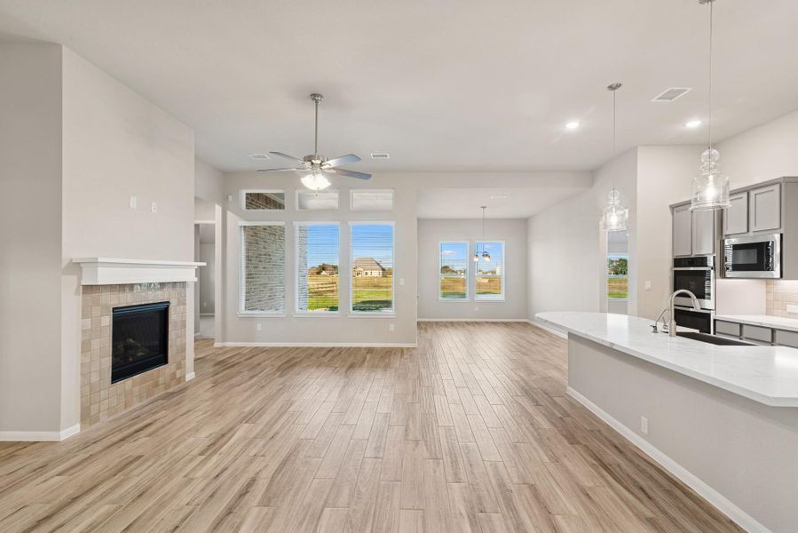 Open great room with fireplace Open great room with fireplace