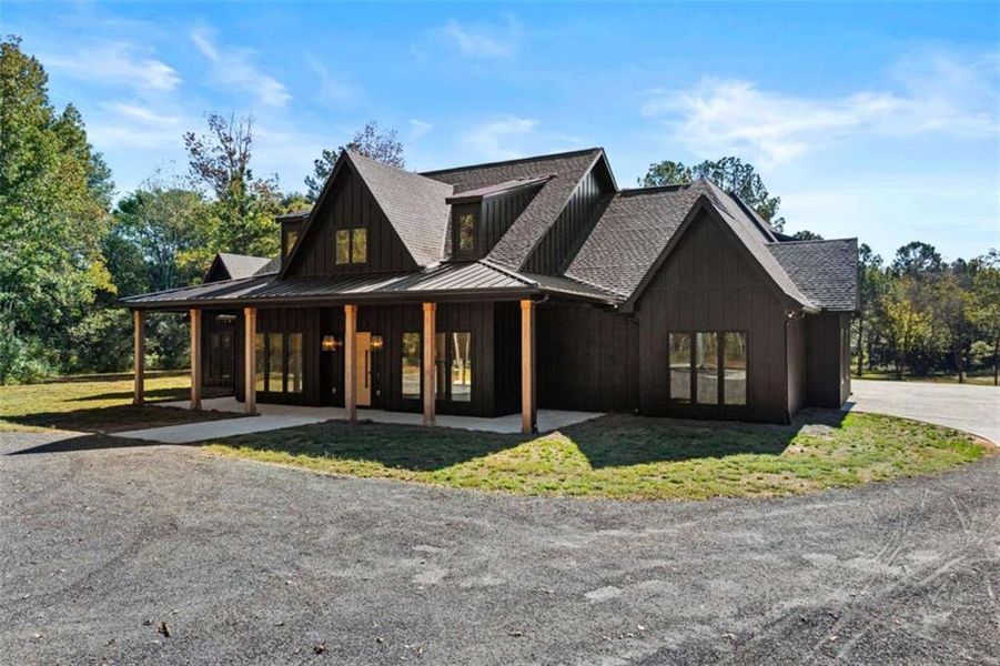 Front exterior of a new home in , Monroe, GA, highlighting curb appeal (Image 26).