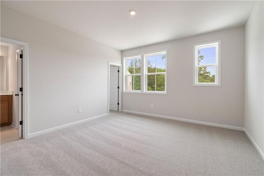 Spacious, unfurnished interior of a new home in Tiberon Woods, Cumming (Image 32).