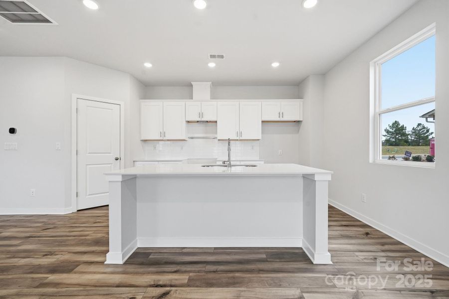 Furnished interior view inside a new home in Meadow Creek Village, Locust (Image 4).