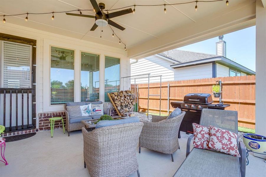 View of patio / terrace featuring a ceiling fan, an outdoor hangout area, and a grill View of patio / terrace featuring a ceiling fan, an outdoor hangout area, and a grill