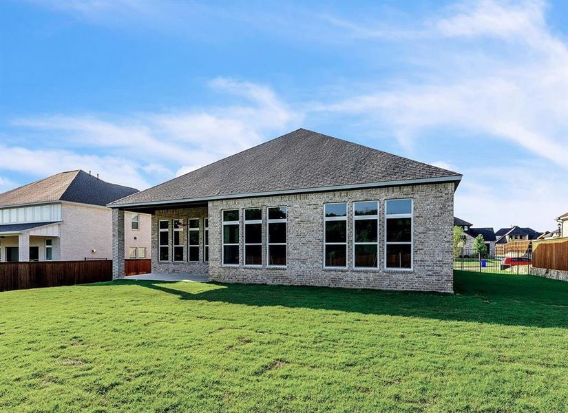 Exterior details and patio area of a home in Oaks Preserve, Mansfield (Image 18).