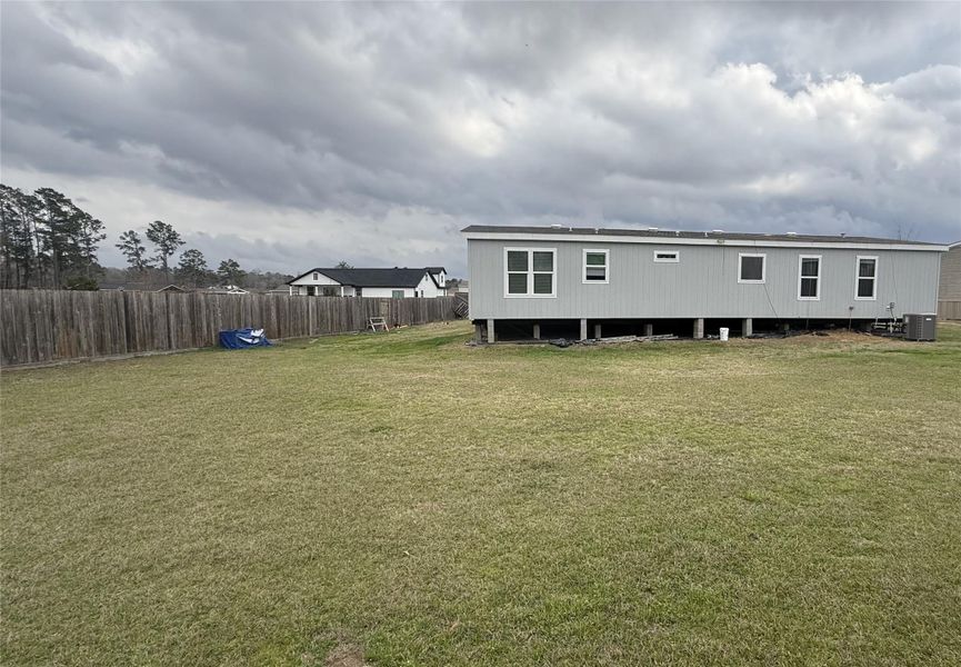Exterior details and patio area of a home in , Conroe (Image 9). Exterior details and patio area of a home in , Conroe (Image 9).