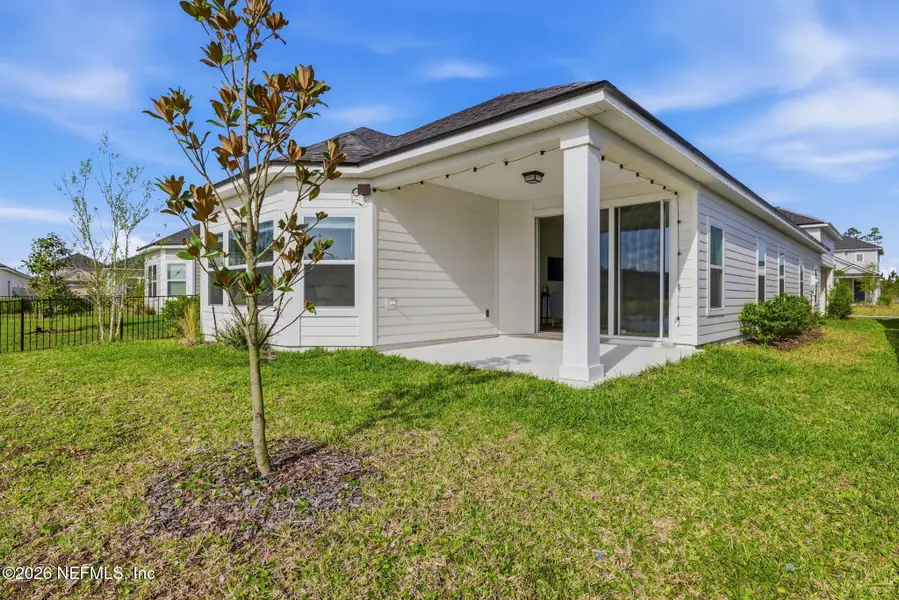 Exterior details and patio area of a home in Beacon Lake, St. Augustine (Image 4).