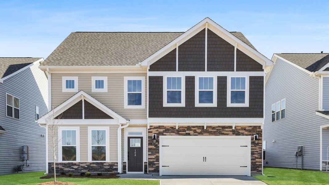 Front exterior of a new home in Seven Oaks, Greenwood, SC, highlighting curb appeal (Image 1). Front exterior of a new home in Seven Oaks, Greenwood, SC, highlighting curb appeal (Image 1).