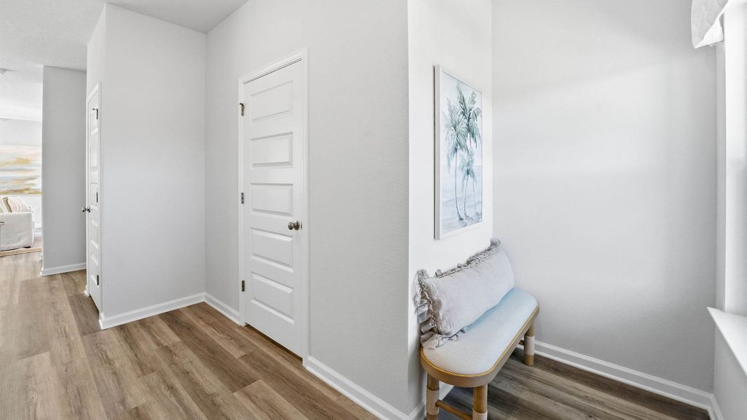 Representative furnished interior of a home built from the The Monroe by D.R. Horton in Chateau Nemours, Port Saint Joe (Image 7).